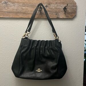 Black Coach Handbag With 3 compartments .